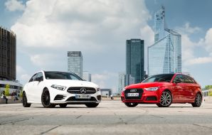 Mercedes Classe A AMG Line blanche vs Audi A3 Sportback S line rouge statique avant à la Défense