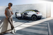 Opel GT X Experimental concept car SUV with electric profile, open doors in studio