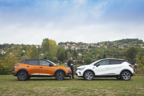 peugeot 2008 orange renault captur blanc statique profil fond campagne