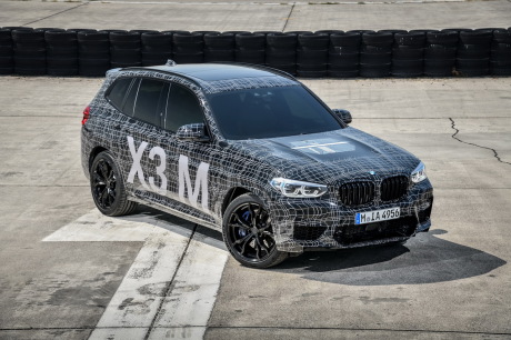 BMW X3 M 2019 gris camouflé statique avant