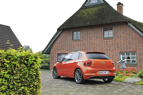 VW Polo Carat orange arrière gauche